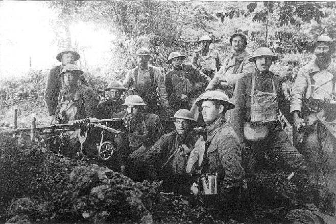 Members of the 77th Co, 6th Machine Gun Battalion & French poilus near Belleau Wood. Unknown date.