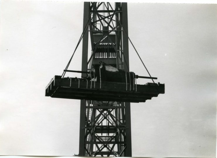 Cranes transfer the guns and carriages from the San Francisco to special trucks bound for Fort Casey. Image Courtesy of David Hansen, Photographer