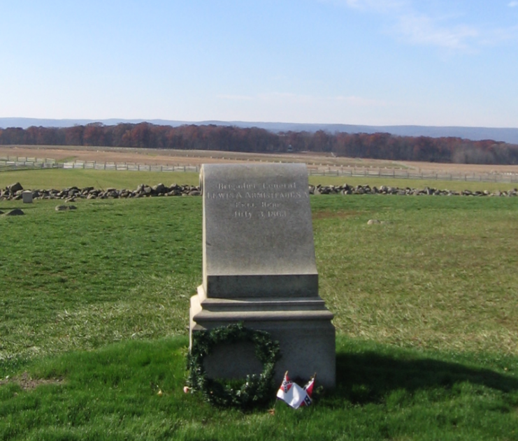 The monument on the Gettysburg Battlefield marking the approximate place where Lew Armistead was fatally wounded. The wall behind the monument marks the Union lines.