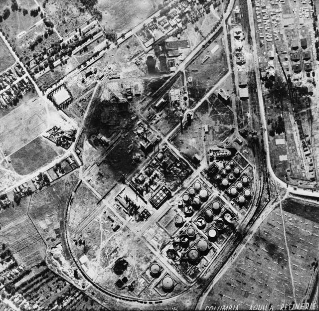 Columbia Aquila refinery after the bombing largely intact, with visible bomb craters.