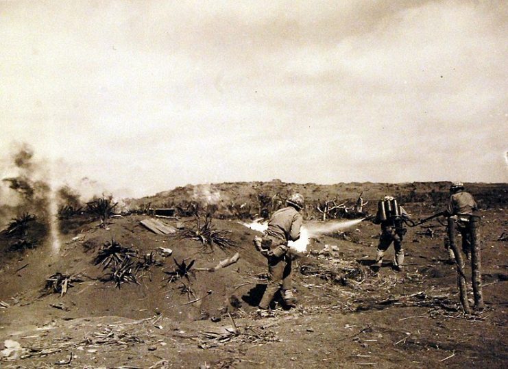 Iwo Jima flame throwers going into action