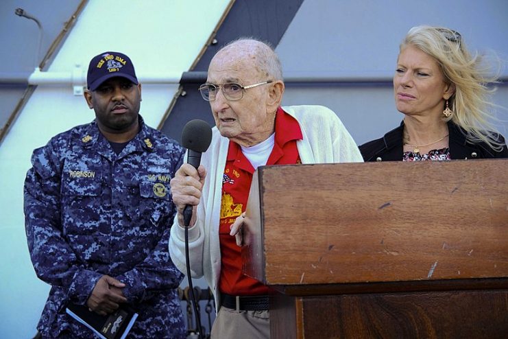 (Feb. 24, 2017) Retired Marine Cpl. Bob Gasche, a battle of Iwo Jima veteran, speaks to the crew of amphibious assault ship USS Iwo Jima