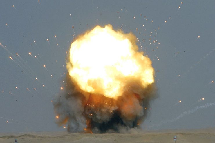 A fireball rises into the sky during a controlled detonation performed by coalition forces from the U.S. Air Force’s 386th Expeditionary Civil Engineer Squadron and the Australian army at an explosive ordnance disposal range in Southwest Asia.