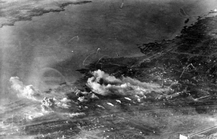 Clouds of smoke and dust rise from the ruins of Stalingrad after German bombing of the city on 2 October 1942. By Bundesarchiv Bild CC-BY-SA 3.0