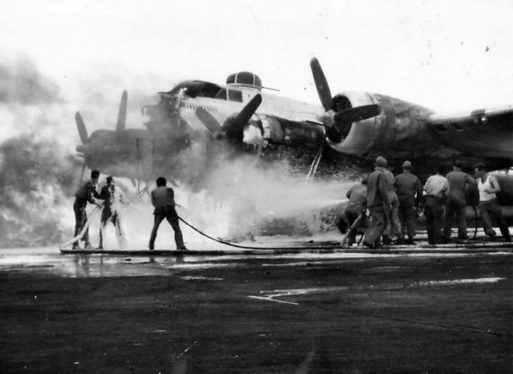 Firefighters working to save B-17 of 8th AF England 1944