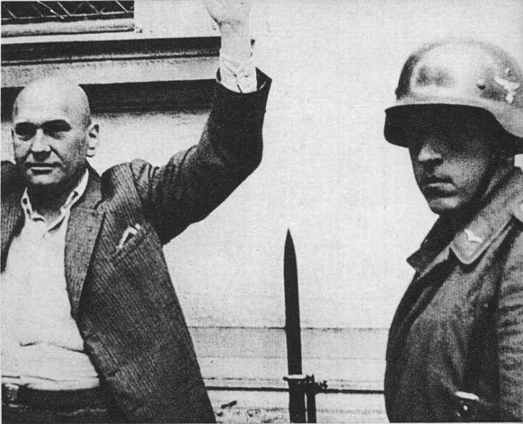Bydgoszcz on 8th September 1939 – first days of German occupation. Polish civilian arrested during the “łapanka” and guarded by Wehrmacht soldiers at rallying point at Parkowa Street.
