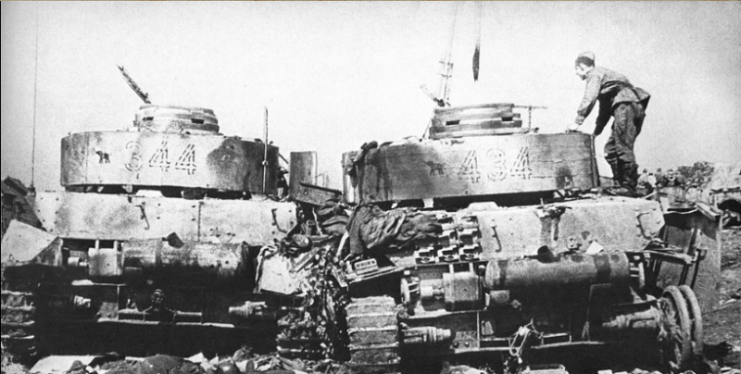 Two Destroyed Panzer IV belonging to the 20. Panzer Division.Soviet Soldiers at the pocket of Bobruisk