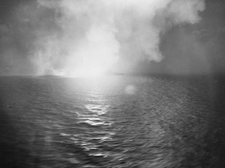 The U.S. Navy battleship USS West Virginia (BB-48) firing during the Battle of Surigao Strait, 24-25 October 1944.