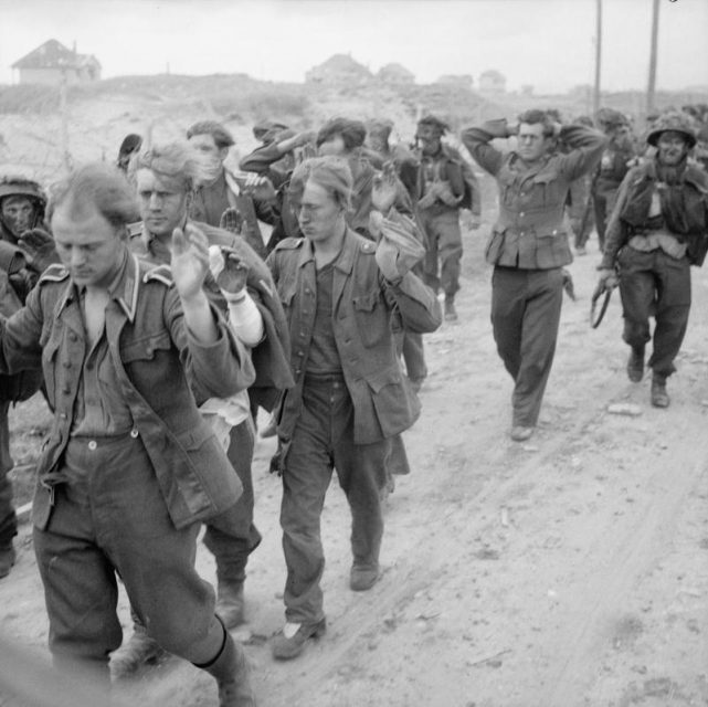 D-day_ German prisoners being marched along Queen beach, Sword