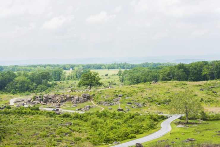 Landscape overlook view from Little Round Top in Gettysburg battlefield national park overlooking Devil’s Den.