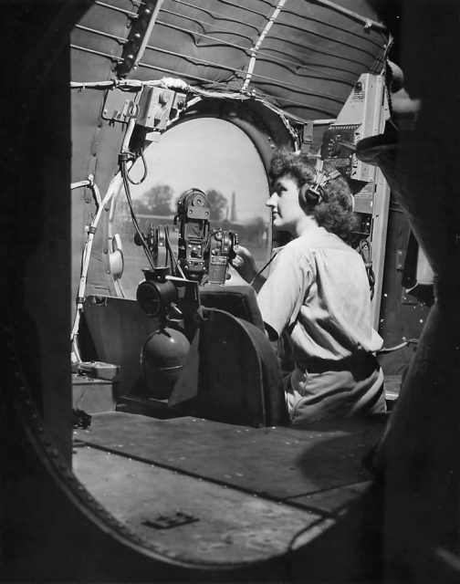 WAC in B-29 Superfortress waist gunner’s seat – Guam 1945