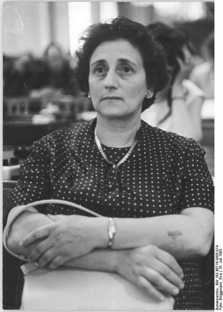 Number tattoo visible on the arm of camp survivor (and, in this photo, 1963 courtroom witness) Eva Furth. Photo by Bundesarchiv, Bild 183-B0716-0005-014 / CC-BY-SA 3.0