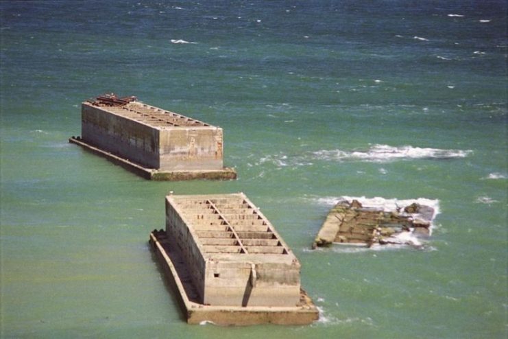 The Phoenix breakwaters reinforced concrete caissons mulberry harbour at arromanches.Photo: Oxyman CC BY 2.0