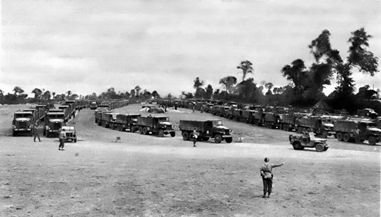 Red Ball Express trucks moving through a Regulating Point – 1944