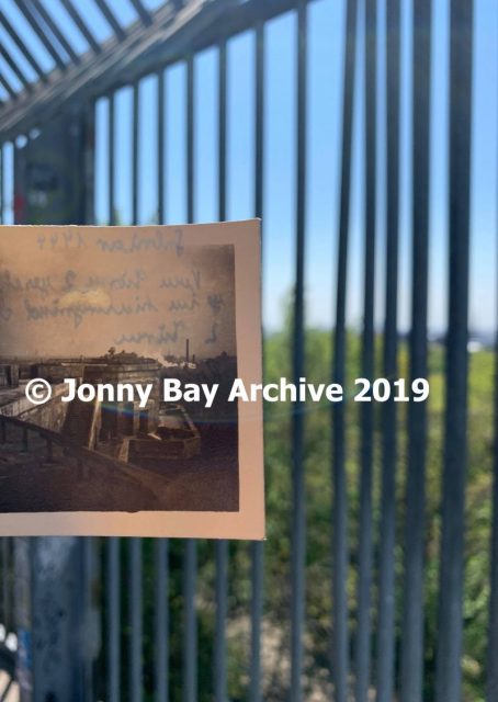 The first ‘Then & Now’ taken on the Flak Tower Humboldthain. The original picture from former Gunner Bärwolf’s photo album is held against the same view today. The opposite edge of the tower was demolished post war, but the exact location where the photograph was taken still remains. Note the stacks of the A.E.G in the distance: the factory still exists, although the stacks are long gone. Source: © Jonny Bay Archive 2019