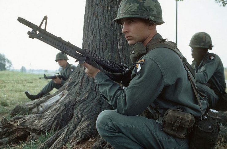 U.S. soldiers wearing M1 helmets