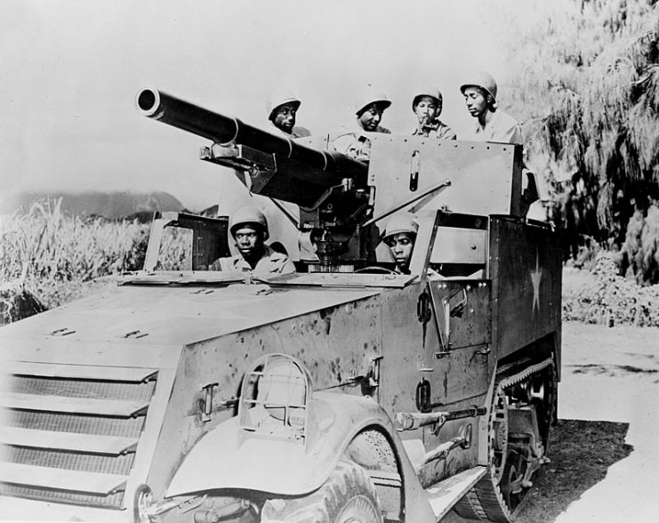 A U.S. Army M3 75mm Gun Motor Carriage manned by US soldiers, 1943.