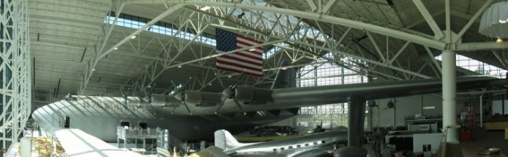 H-4 Hercules at Evergreen Aviation & Space Museum. A Douglas DC-3 has been parked beneath the its wing, to show the scale of the H-4. Photo: Drew Wallner / CC BY 3.0