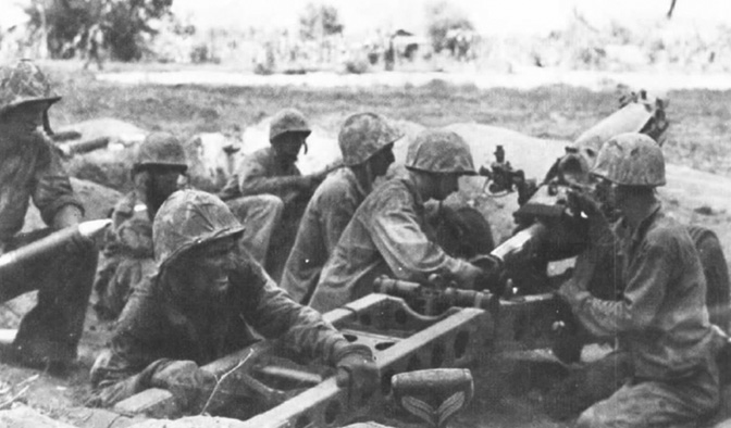 Tenth Marines howitzer section in action during the campaign for Saipan shows how crew drill was used in combat.