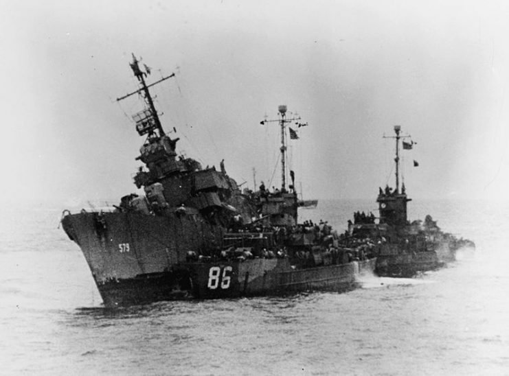 The U.S. Navy destroyer USS William D. Porter (DD-579) sinking after a near-miss by a “Kamikaze” aircraft off Okinawa, 10 June 1945.