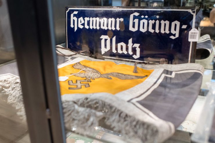 An enamel plate reading “Hermann Goering-Platz” square and a kettledrum decoration GETTY