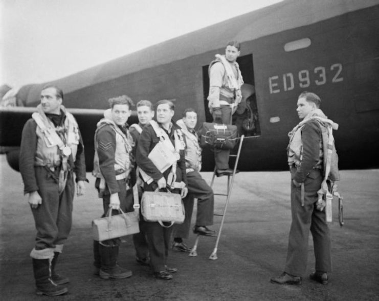 Dambusters Wing Commander Guy Gibson (in door of aircraft) and his crew board their Avro Lancaster bomber for No. 617 Squadron’s raid on the Ruhr Dams, 16 May 1943.