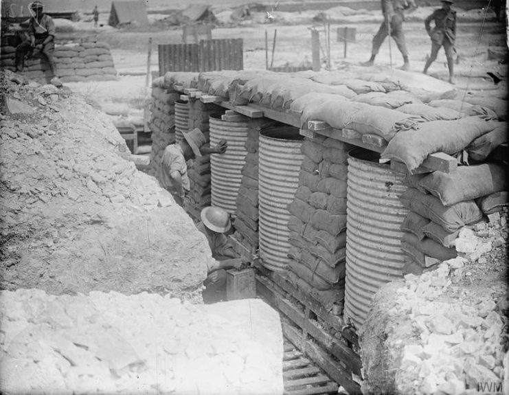 Drinking water stored in sandbagged sunken butts off the Albert-Pozieres road. August 1916.