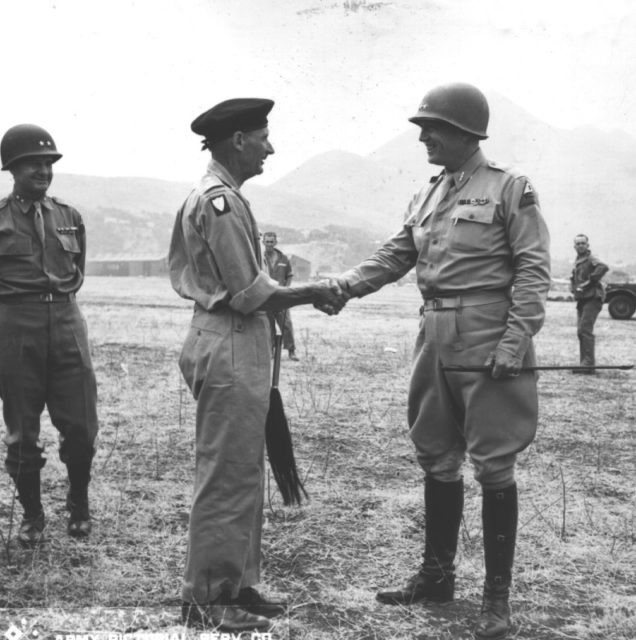 General Bernard Law Montgomery is bid a jolly farewell by Lieutenant General George S. Patton. An Airport at Palermo, Sicily, 28 July 1943. [Signal Corps Photo MM-Bri-7-28-43-R2-6]