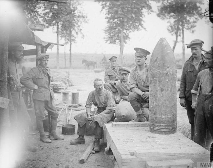 Group of the Royal Garrison Artillery troops and 15 inch shells. The Albert-Amiens road, near Albert.