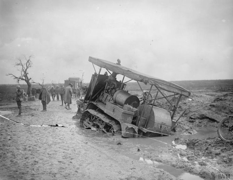 Hold Caterpillar Tractor sunk in the mud on the Guillemont-Martinpuich road in October 1916.