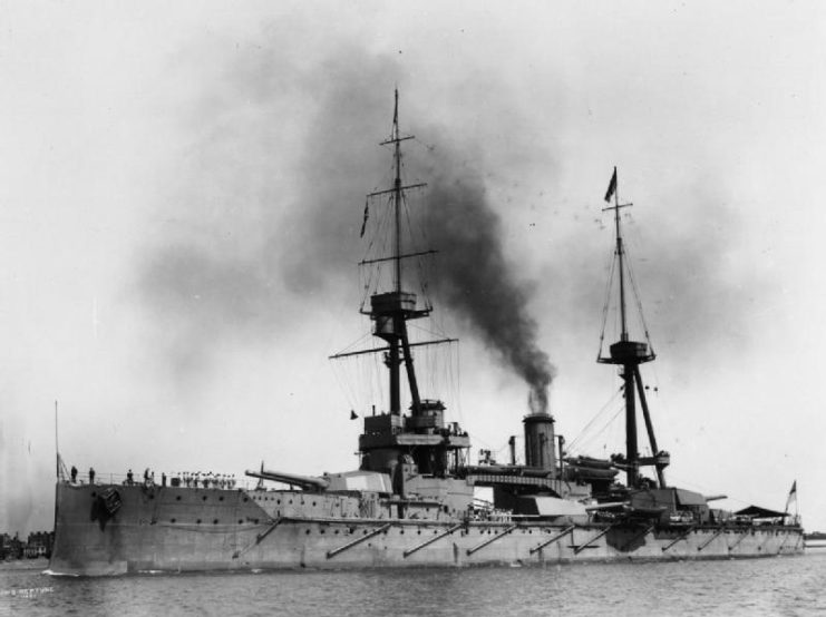 The HMS Neptune in 1911. HMS Neptune was the first British battleship to feature superfiring guns, a turret arragement that allows both turrets to fire any any given direction at the same time.