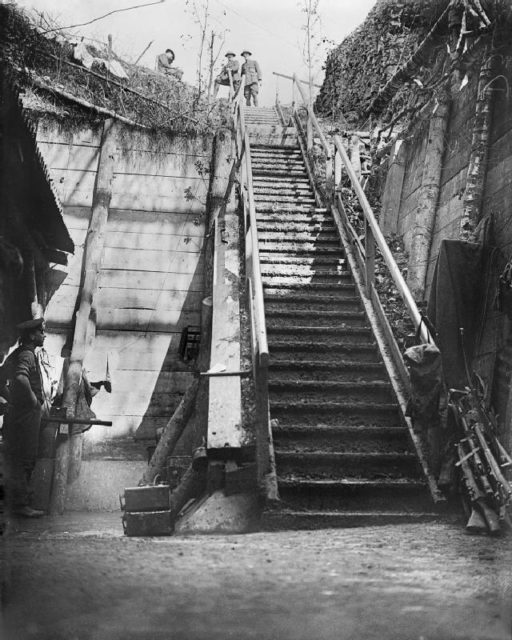 The steps leading down to a huge German underground shelter at Bernafay Wood, near Montauban. The picture gives a good idea of the size and depth of many German dugouts on the Somme