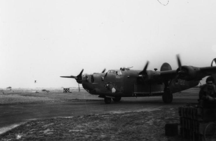 A B-24 Liberator (Q2-M_, serial number 42-52534) nicknamed Witchcraft of the 790th Bomb Squadron, 467th Bomb Group taxiing around Rackheath airfield preparing to take off.