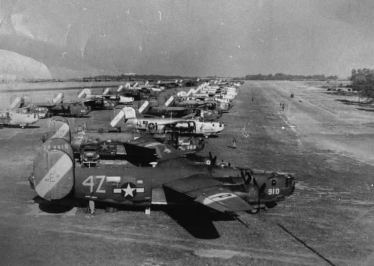 B-24 Liberators of the 467th Bomb Group lined up at RAF Welford. B-24 (4z-E+, serial number 42-94910) is visible in the foreground.