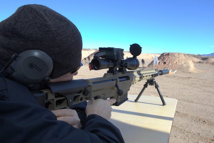 Shooting a Barrett MRAD chambered for .308 Winchester with suppressor. Image by Micheal Dorausch CC BY-SA 2.0