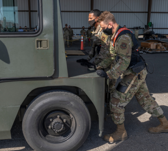 Experimental exoskeleton in use by porters at Travis AFB.