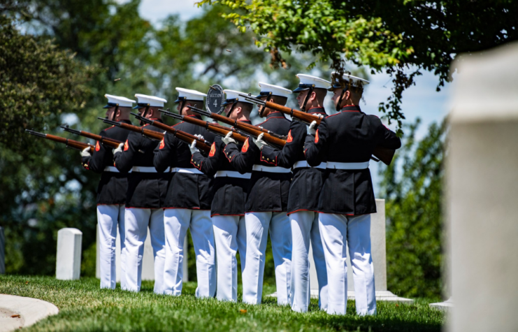 Rifle salute at section 4 of Arlington National Cemetery during ceremony for John Warner