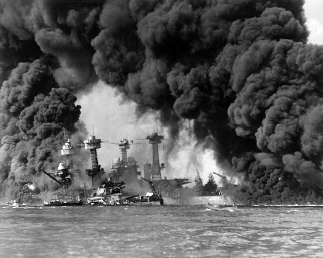 Battleships on fire during the attack on Pearl Harbor