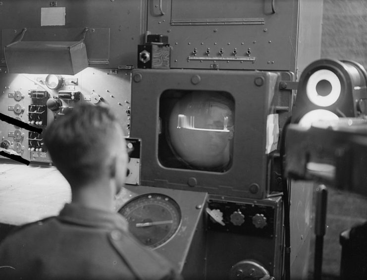 Coastal artillery operator looking at a radar screen