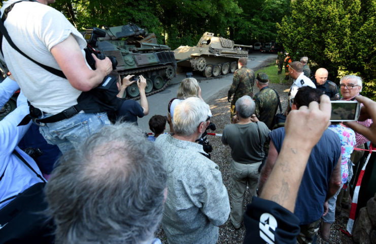 Crowd gathered around the Panther Tank during its removal