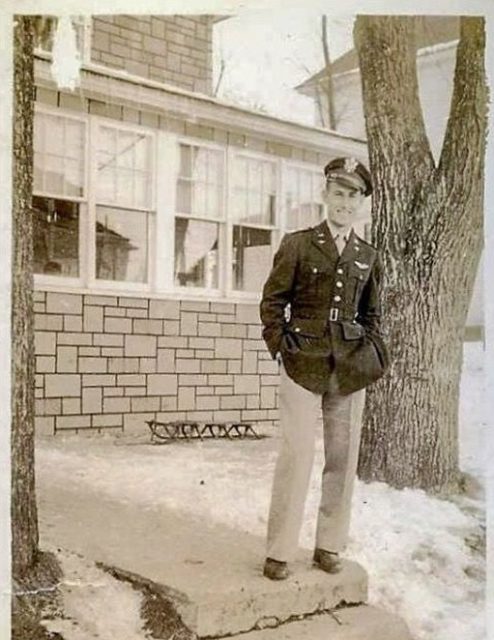 Ernest N. Vienneau standing outside in his military uniform