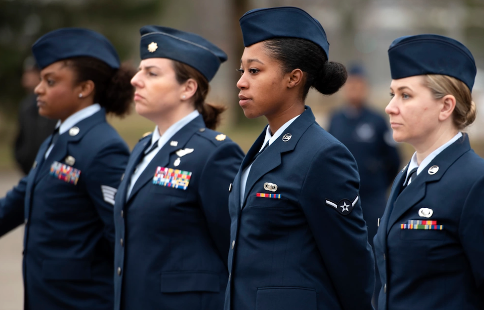 Four female Air Force personnel standing in uniform