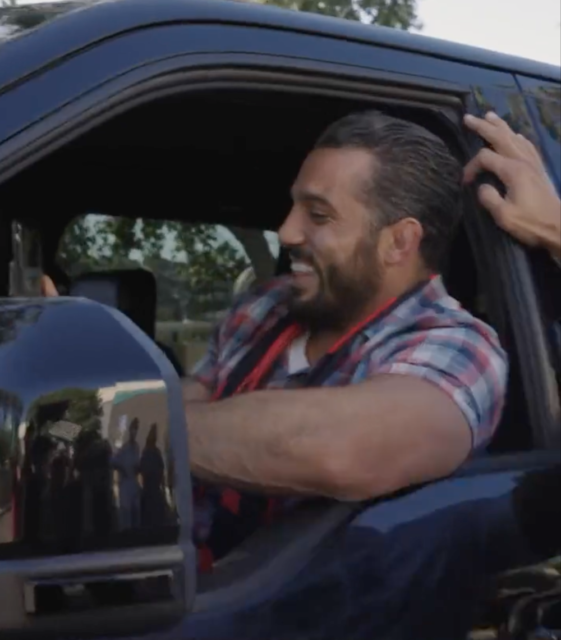 Oscar Rodriguez sitting in a pickup truck