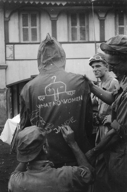 Comrades had drawn Kilroy together with the statement “What no women”, the head of Donald Duck and the word “Jampie” on the back of a rain jacket of a Dutch soldier, 1948 (Photo Credit: Dutch National Archives / Wikipedia / Public Domain)