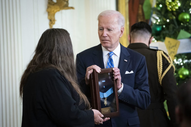 Joe Biden presenting the Medal of Honor to Alwyn Cashe's widow, Tamara