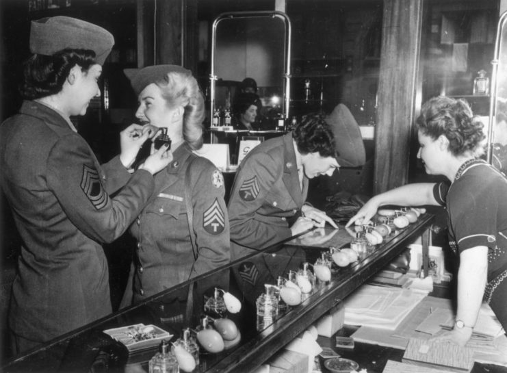 Women testing perfume at a store