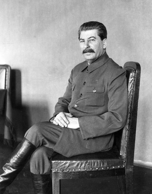 Joseph Stalin sitting in a chair