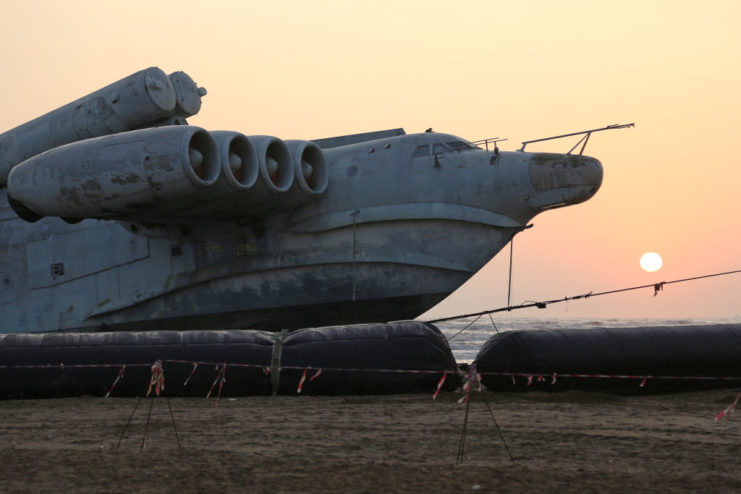 Lun-class Ekranoplan MD-160 sitting on the beach at sunset