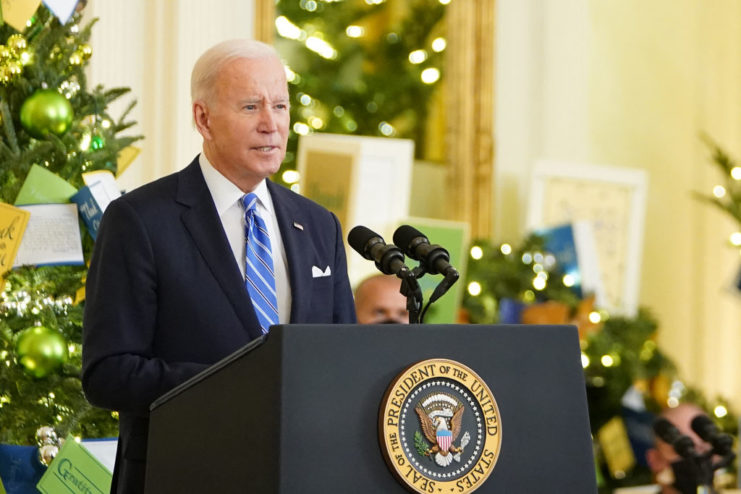 Joe Biden standing behind the Presidential podium