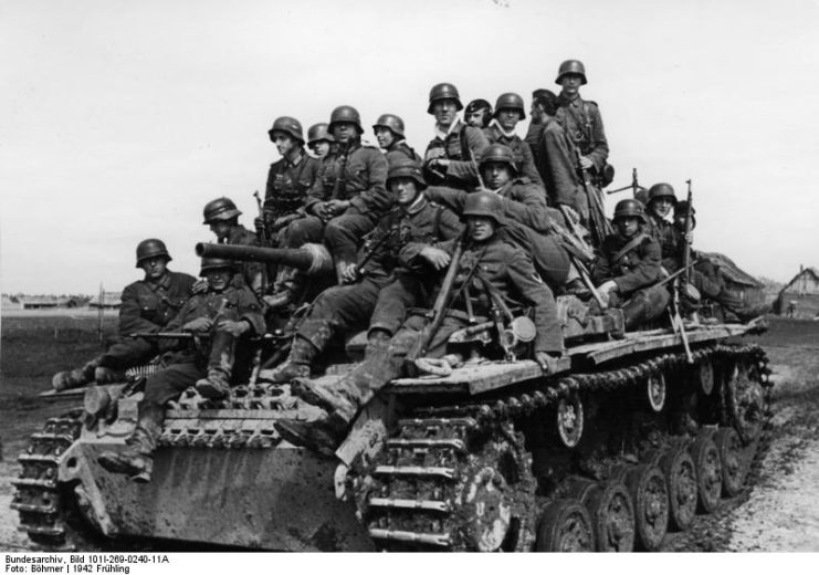 Panzer III carrying infantry in March 1942